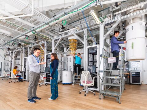 Researchers collaborating on the development of quantum technologies at the SQMS Quantum Garage, one of the quantum research facilities developed by the Centre. ©Ryan Postel, Fermilab